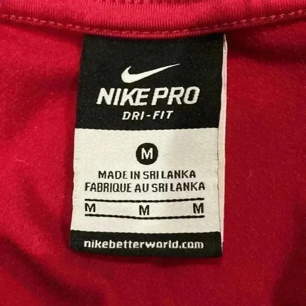 Nike pro dri-fit reddish pink sports jacket in size medium